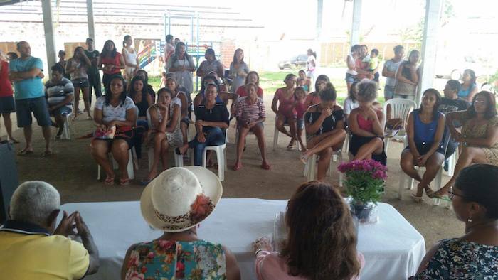Pessoas na plateia.
