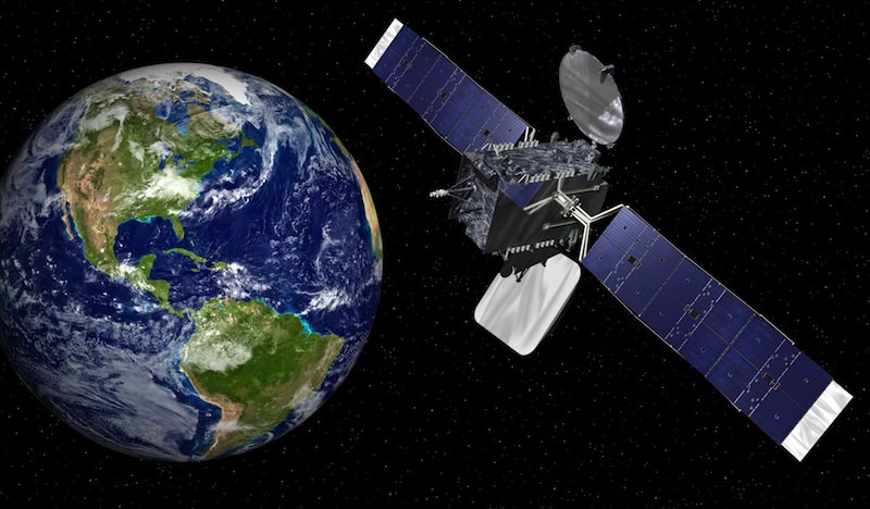 Foto de uma satélite orbitando em volta de terra
