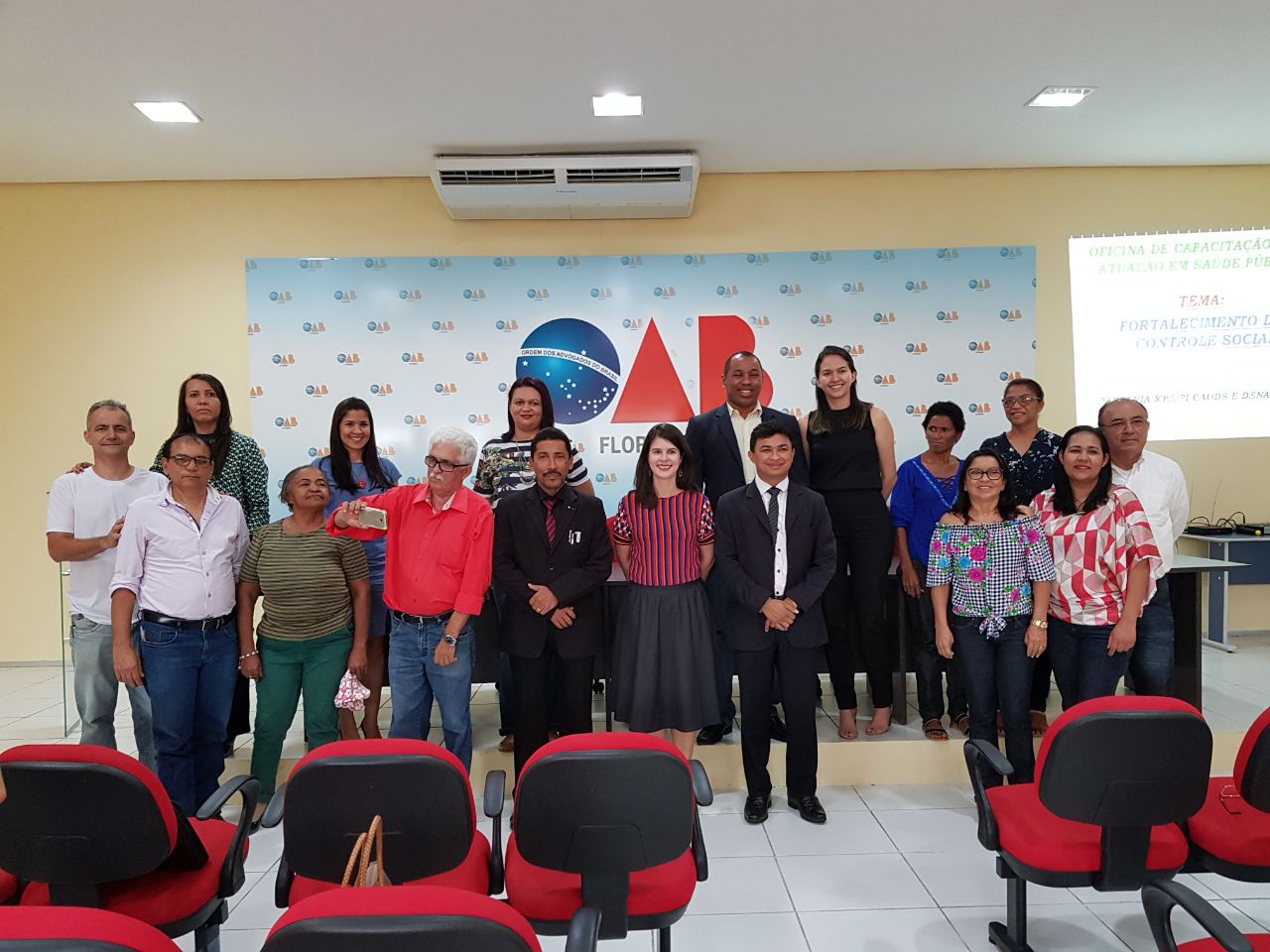 Equipe no auditório da OAB